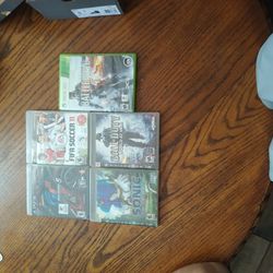 Four Games Of PS3 And One Xbox 360 Game