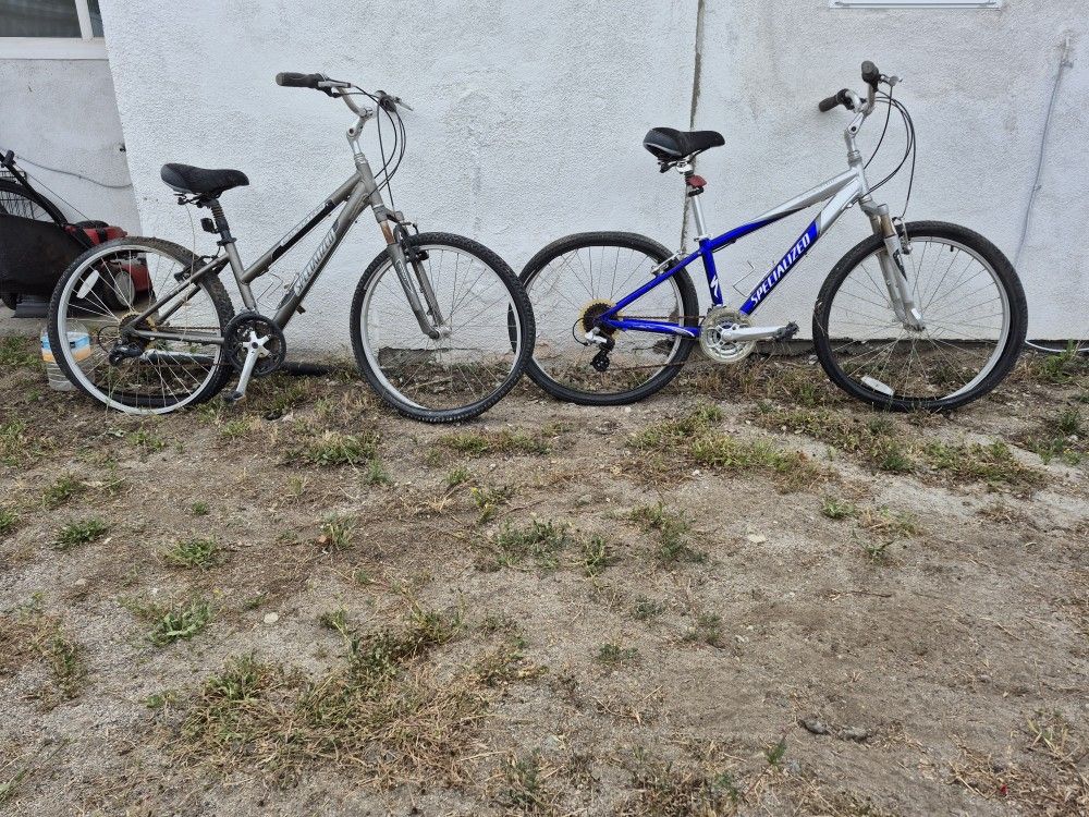 $50 EACH. USED SPECIALIZED EXPEDITION SPORT BICYCLES. ONE BLUE ONE GREY