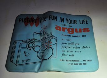 Vintage Argus match-matic C3 rubber advertisement 11"x8.5"