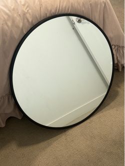 Black round mirror