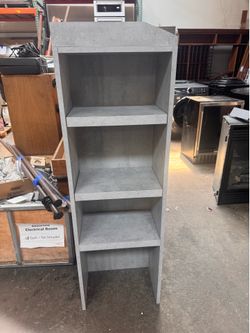 Shelving unit with extra spacer