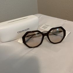 Authentic Calvin Klein sunglasses, Woman, New.