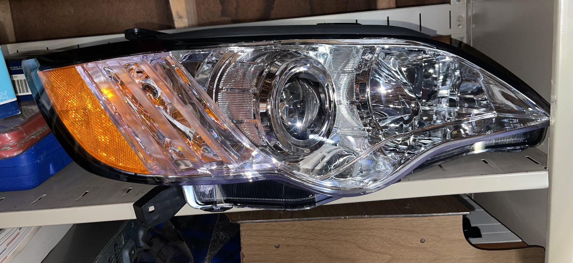 Brand New TYC Headlight Assembly for the Passenger Right Side of a Subaru Outback Wagon.