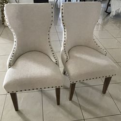 2 BEIGE UPHOLSTERY DINNING CHAIR PICK UP TODAY