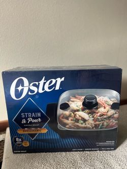 Brand New Oster Electric Skillet in Box! Features a durable DuraCeramic nonstick coating and a convenient Strain & Pour design for easy cooking and se