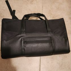 Travel suit bag with pockets