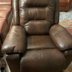Power Reclinet. Genuine Top Grain Leather. Very Good Condition. Very Comfortable. Little Scratch From Moving It Out From The Room. Only  4 Years Old. 