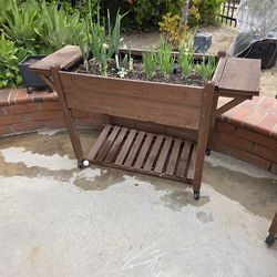 Raised garden planters box on wheels