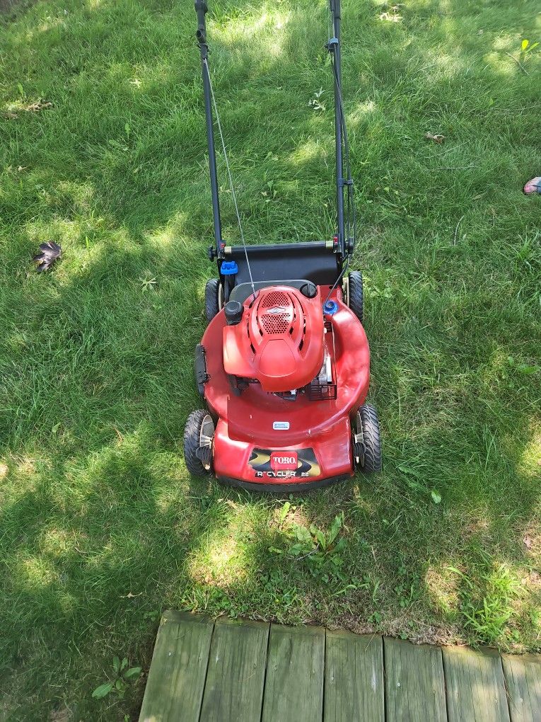 Toro  Self Propelled Mower. Serviced Yearly, works great just turned it on!!