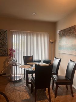Round Glass Dining Table with 4 Chairs  Silverado and Maryland Parkway area. Pick up only. Cash only.