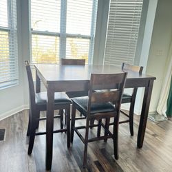 Table And 4 Chairs 