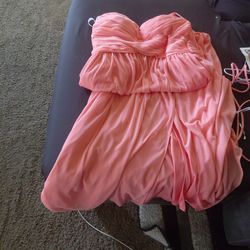 Melon color gown pleated around top  around the breastfeeding v ront