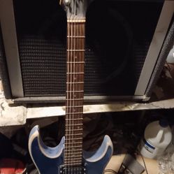 Ibanez Gio /Peavey 130watt Solo Amp