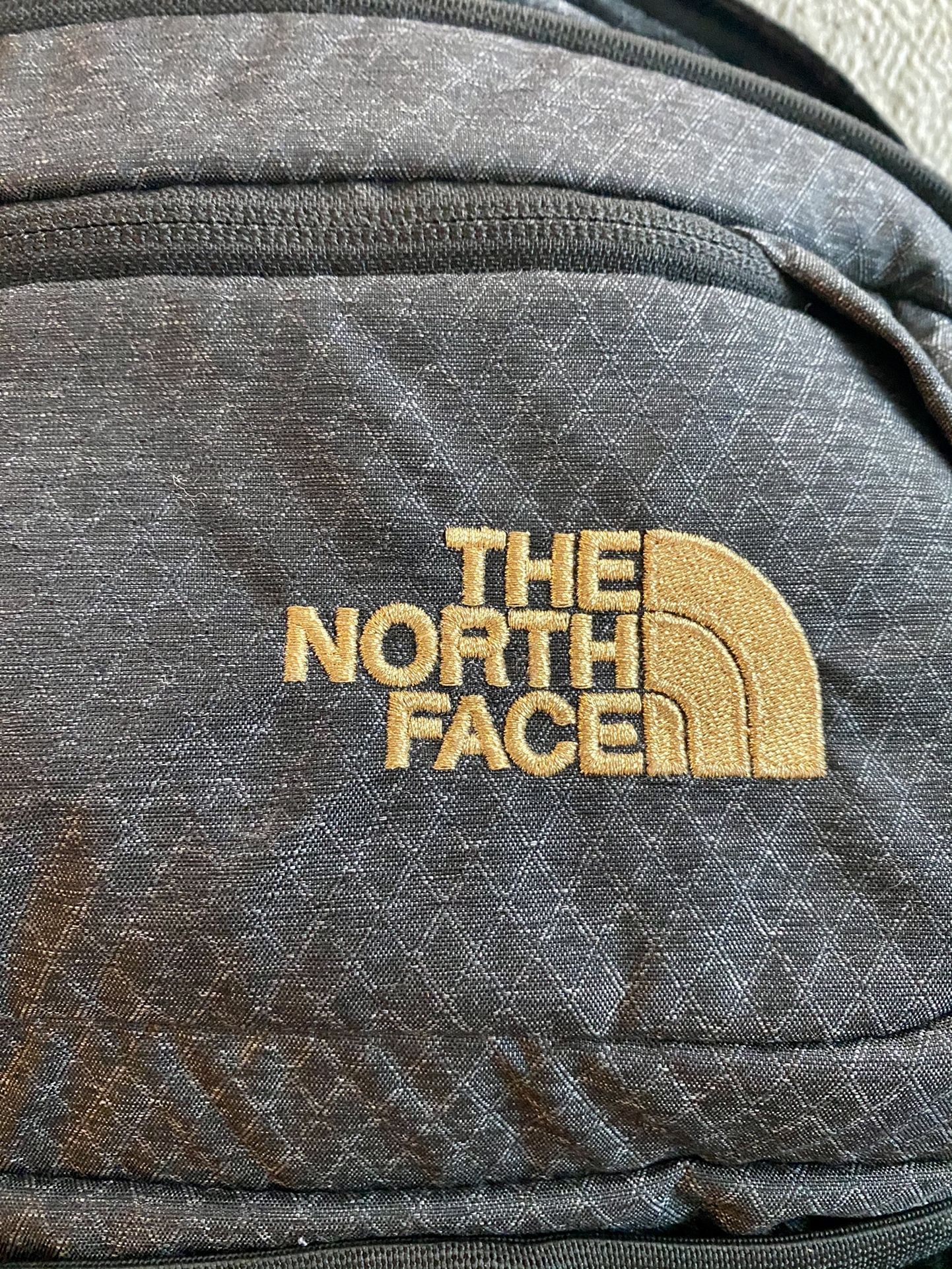The North Face Womens Recon Backpack TNF Black 24K Gold One Size