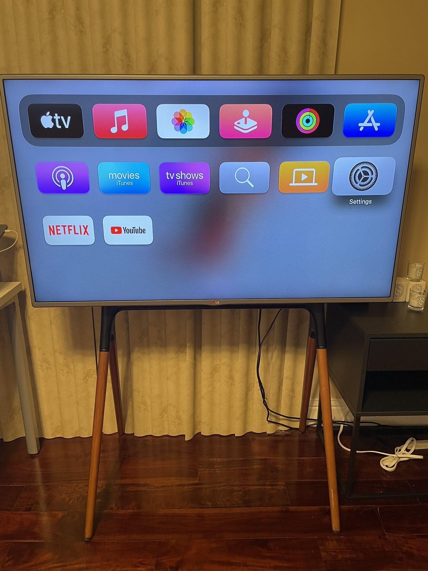 LG 50” TV + TV Stand + Apple TV