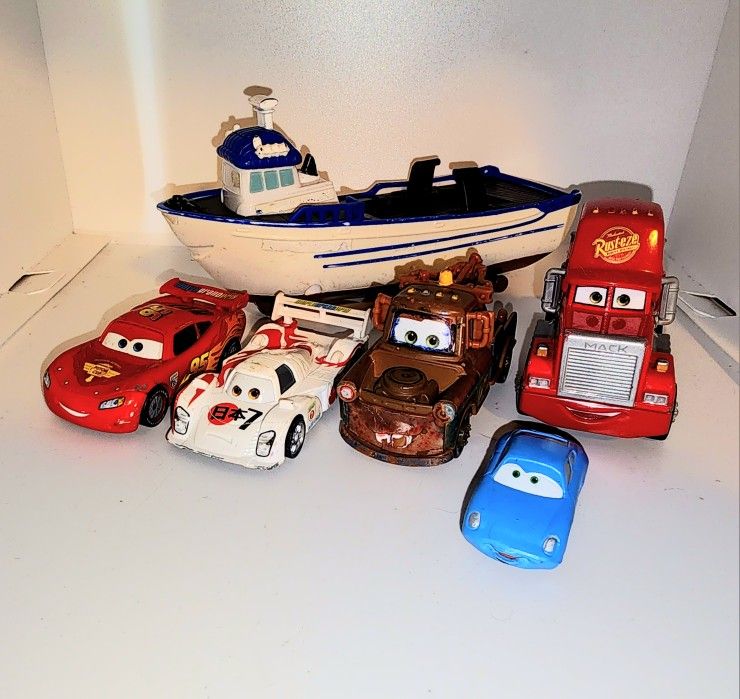 lot of Disney Pixar CARS vehicles including the rare Crabby Boat quick changer