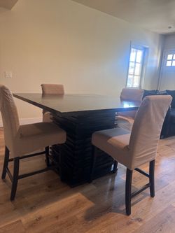 Black dining room table and chairs