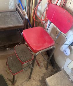 retro chair and step stool featuring a bright red vinyl seat and pull-out two-tier steps.