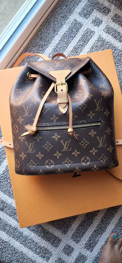 Authentic  Lv Bagpack