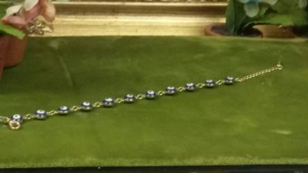 Stainless steel evil eye bracelet in gold tone