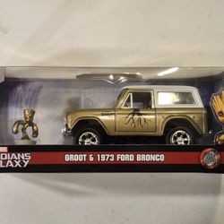 JADA 1:32 SCALE METAL DIECAST. MARVEL. GUARDIANS OF THE GALAXY. GROOT.  1973 FORD BRONCO WITH GROOT METAL DIECAST FIGURE. 