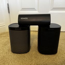 Three (3) Sonos speaker lot: Sonos Play 1, Sonos One, Sonos Roam