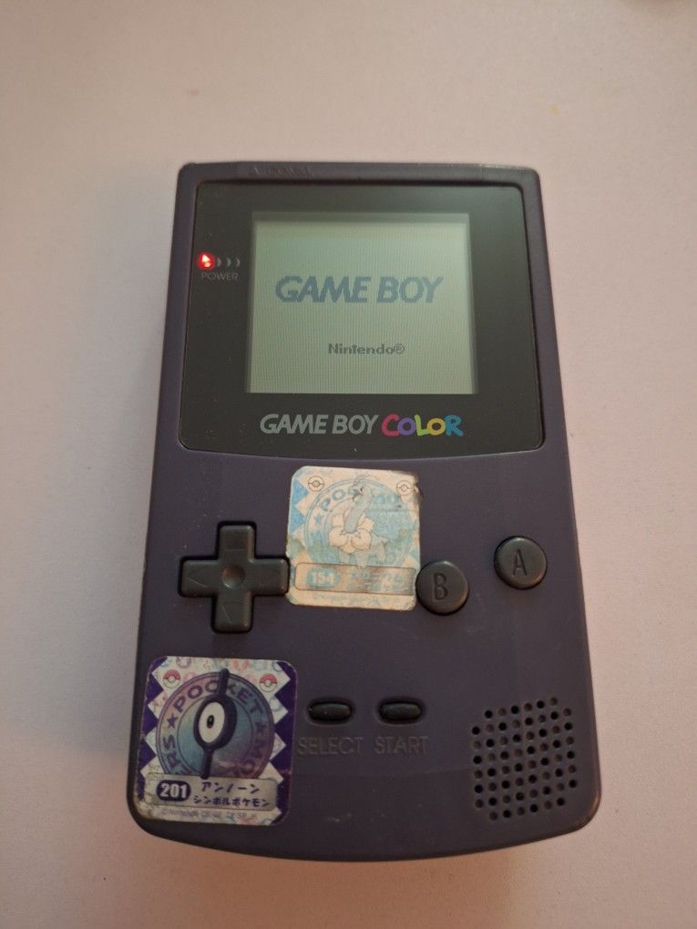 Gameboy Color With Pokemon Stickers