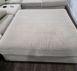 Extra-large ottoman. Free. If interested, message me, and I'll set it outside.