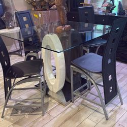 Table and chairs will sell separately