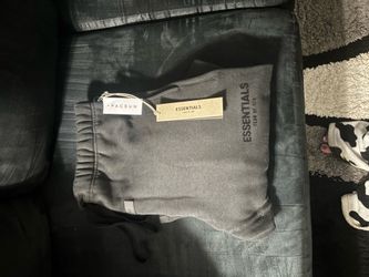 Brand new black size medium essentials, uncuffed sweats