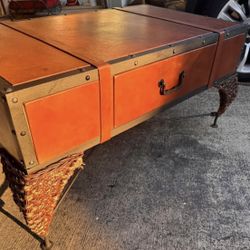 One of a kind trunk leather cast iron coffee table. 