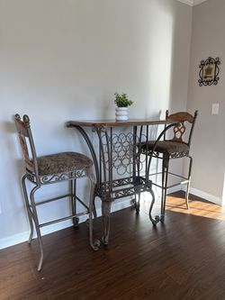 Wood and Iron Pub Table with cushion seating