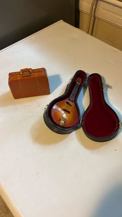 Mini guitar and suitcase
