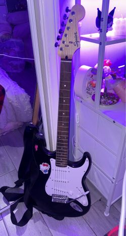 Squier Stratocaster Electric Guitar + Fender Frontman 10G Amp + Strap