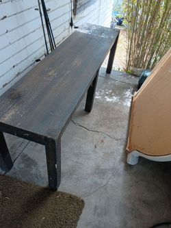 Six leg bench could be used for setting or knick knacks whatever you want to use it for