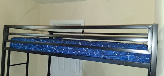 Black metal loft bed. Twin size. Frame only.