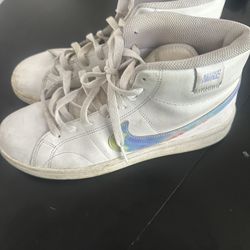 White And Multicolored Nike’s