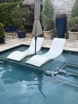 Plastic pool loungers