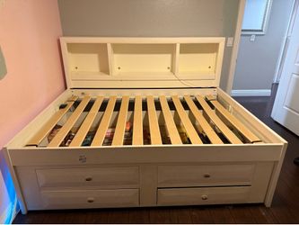 Full size bed frame with twin trundle