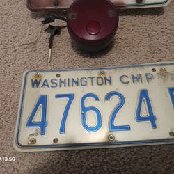 Vintage Washington State License Plates.  Camper and  Trailer with the original mounting bracket.   A Must Have Lot Of (2)