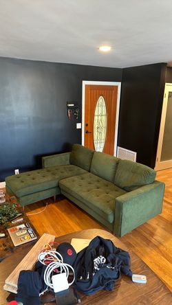 Green L shaped couch