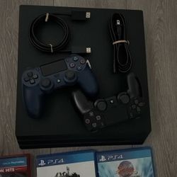 PS4 Pro With 2 Controllers & Games