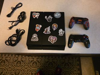 Sony PS4 Slim Console with Two Controllers