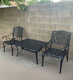 Patio set. Table and chairs. Very nice. All metal.