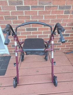 New standard walker with seat and storage bag.  Please read Description