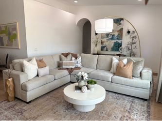 Living Spaces beige sectional sofa
