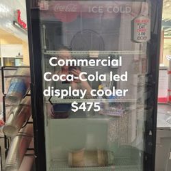 Commercial Coca-Cola display LED light cooler.