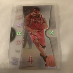 2006-07 Fleer E-X Tracy McGrady - Houston Rockets HOF #19