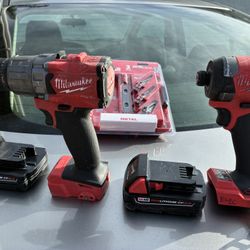 Milwaukee Impact Fuel , Drill Fuel , 2 batteries 2 ah, Step Drill Bit Set 