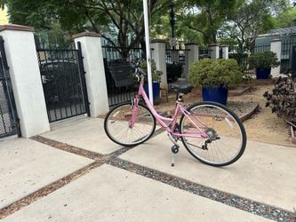 Women’s beach cruiser- bike, downtown San San Diego